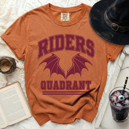 Orange t-shirt with "RIDERS QUADRANT" and bat wings graphic.