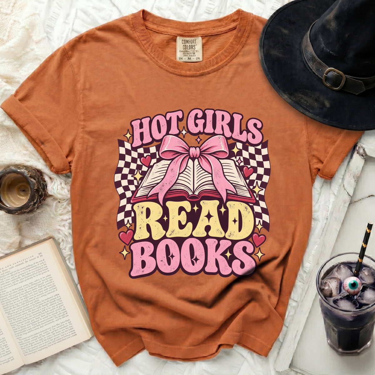 Orange t-shirt with "Hot Girls Read Books" graphic featuring an open book and bow.