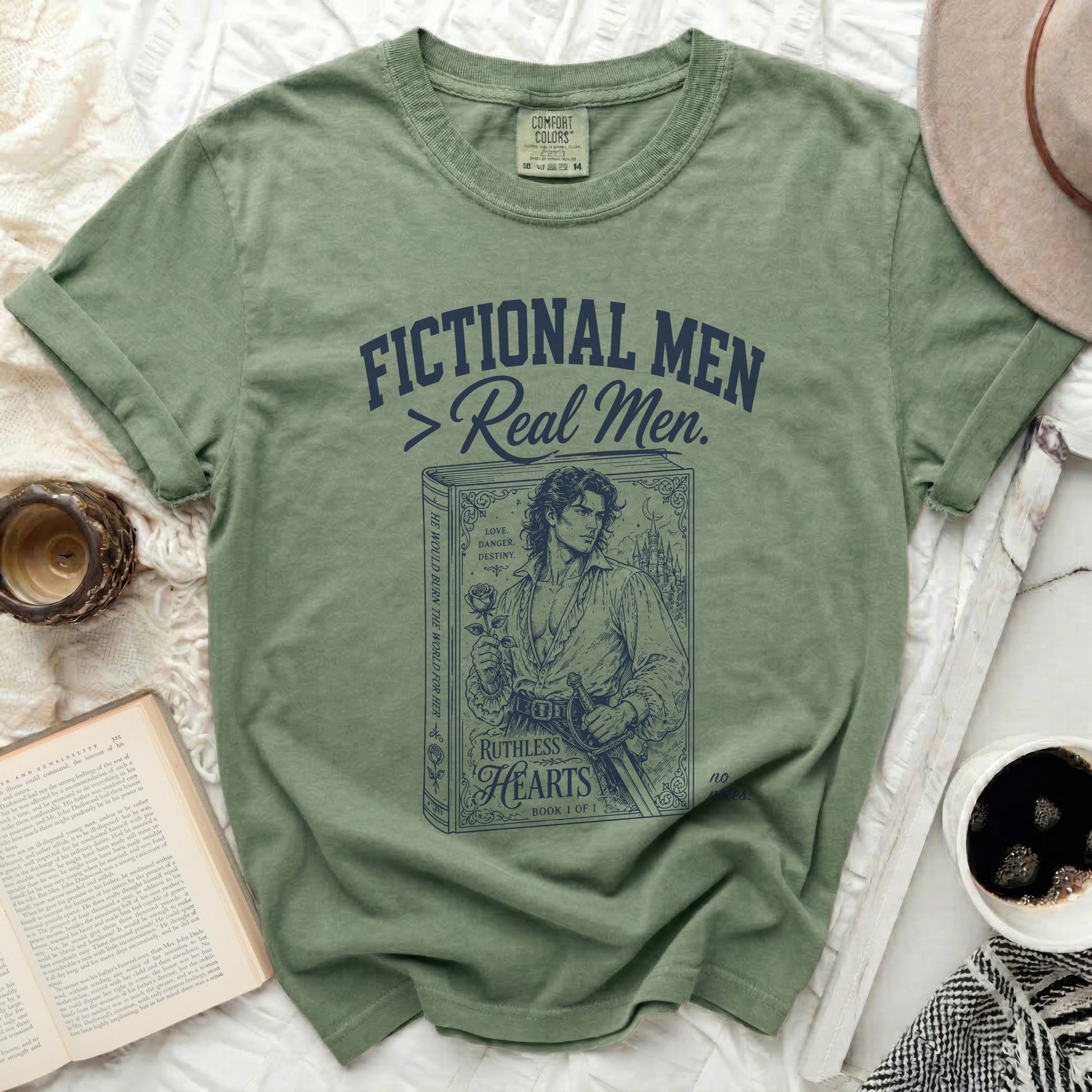 Green t-shirt with "Fictional Men" and a drawing of a man with a rose.