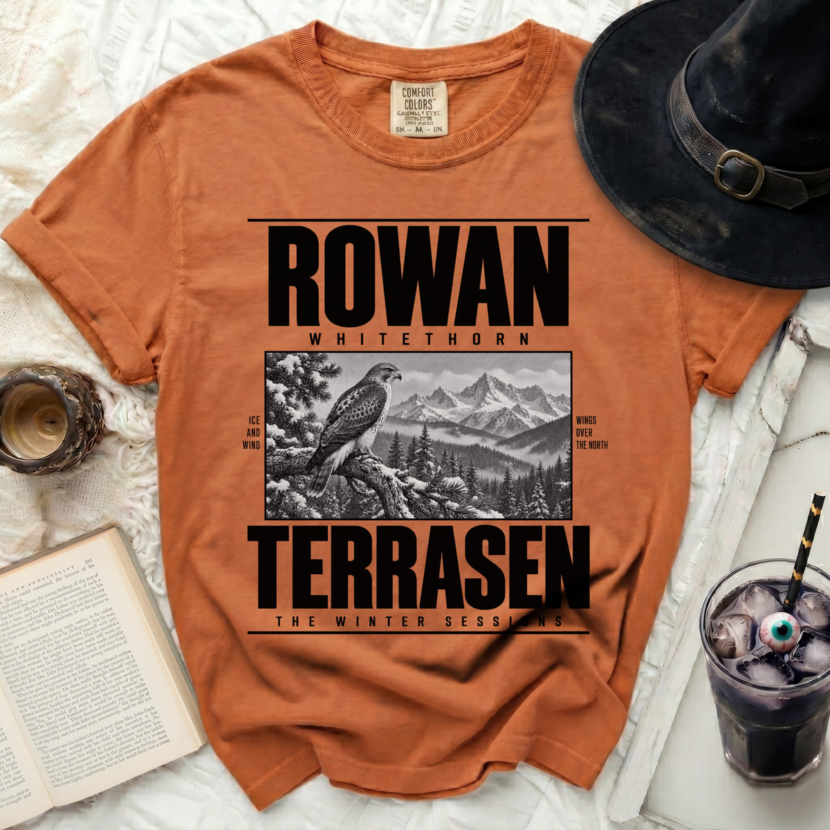Orange shirt with "ROWAN WHITETHORN TERRASEN THE WINTER SESSIONS" graphic.