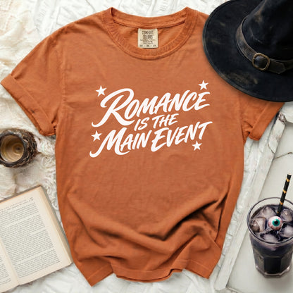 Orange t-shirt with white text "Romance is the Main Event".