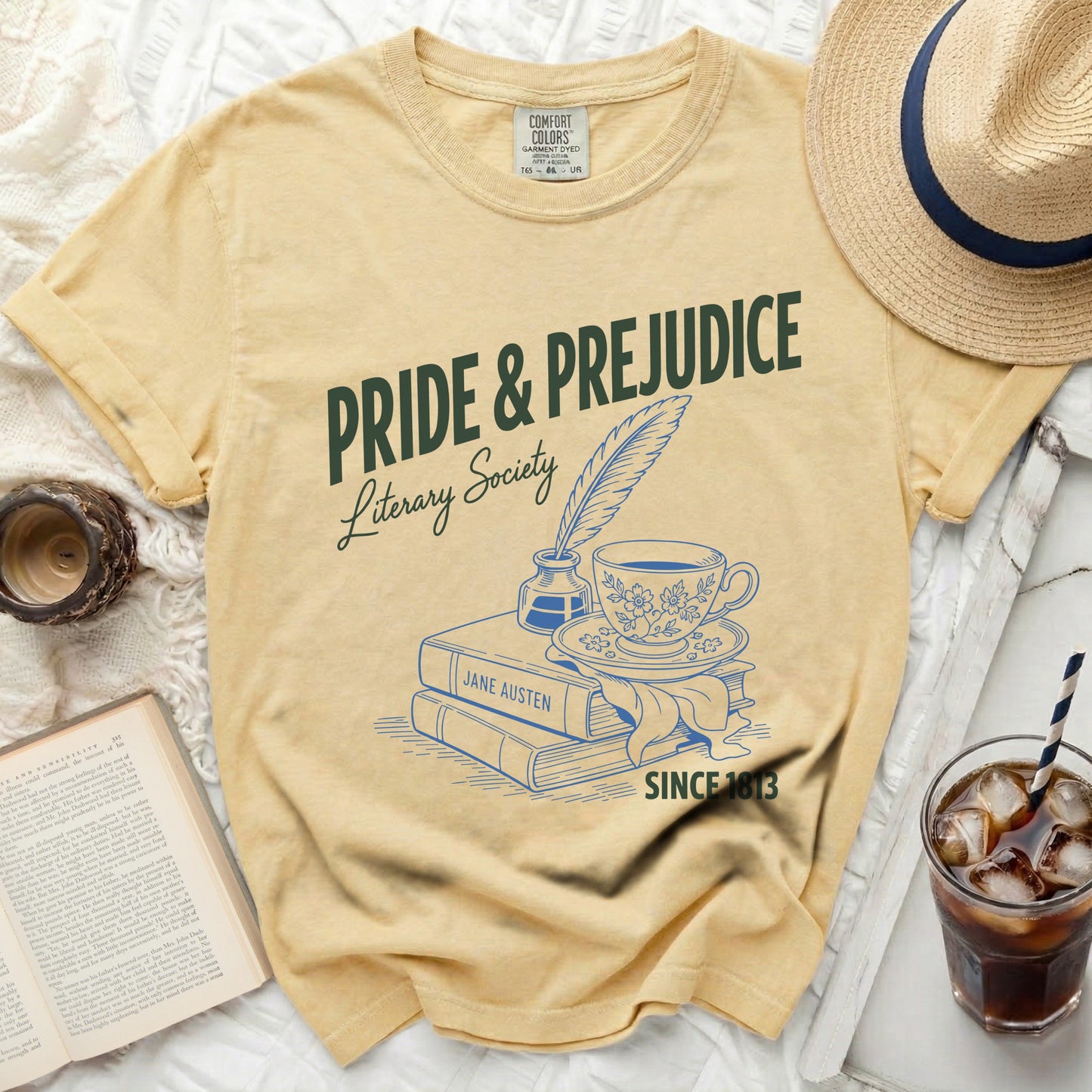 Yellow t-shirt with Pride & Prejudice Literary Society graphic and Jane Austen books.