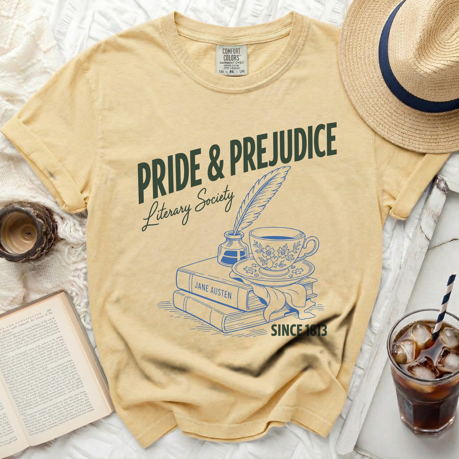 Yellow t-shirt with Pride & Prejudice Literary Society graphic and Jane Austen books.
