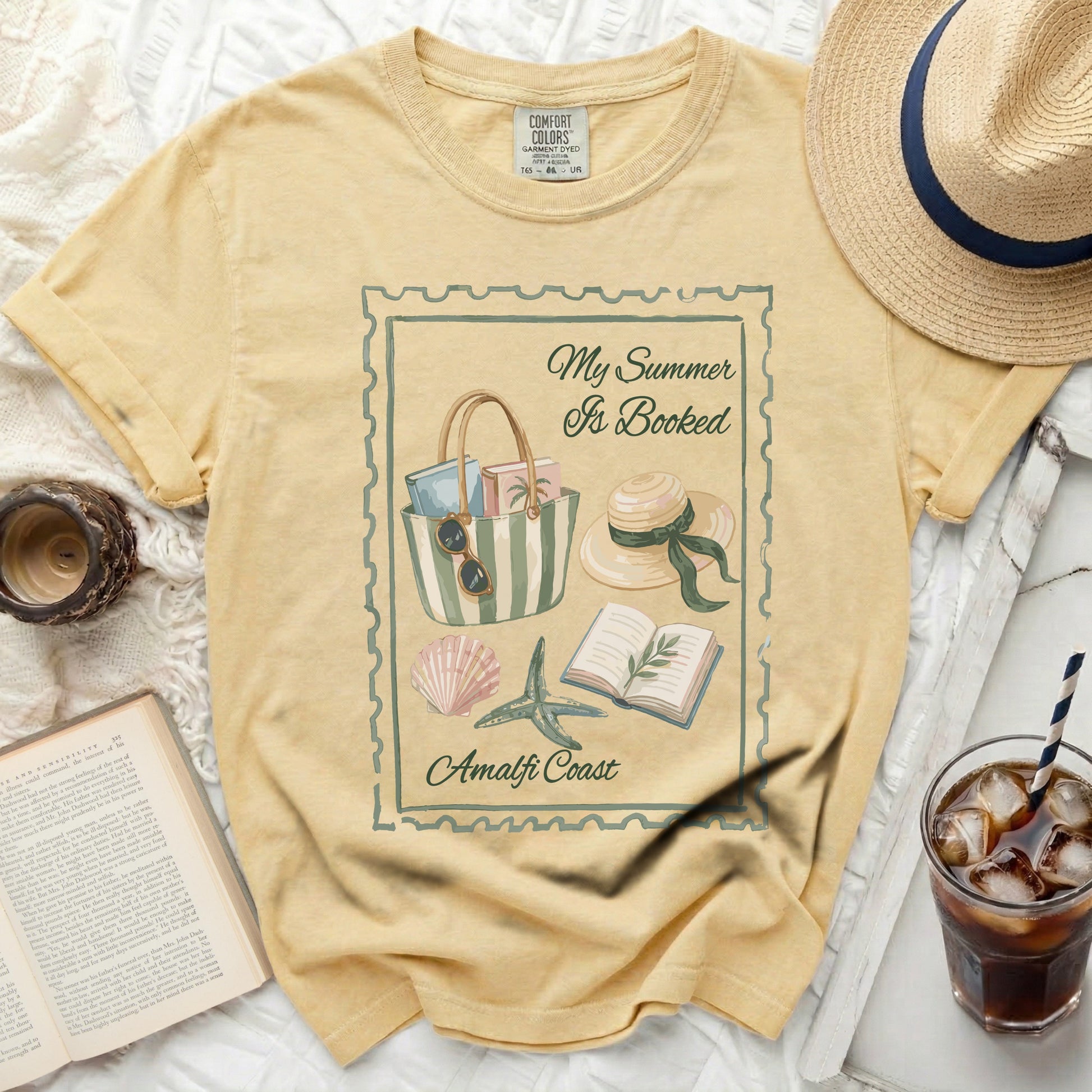 Yellow t-shirt with "My Summer Is Booked" and Amalfi Coast graphic.