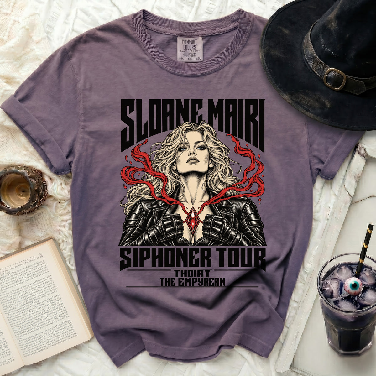 Purple t-shirt with Sloane Mairi Siphoner Tour graphics featuring a woman.