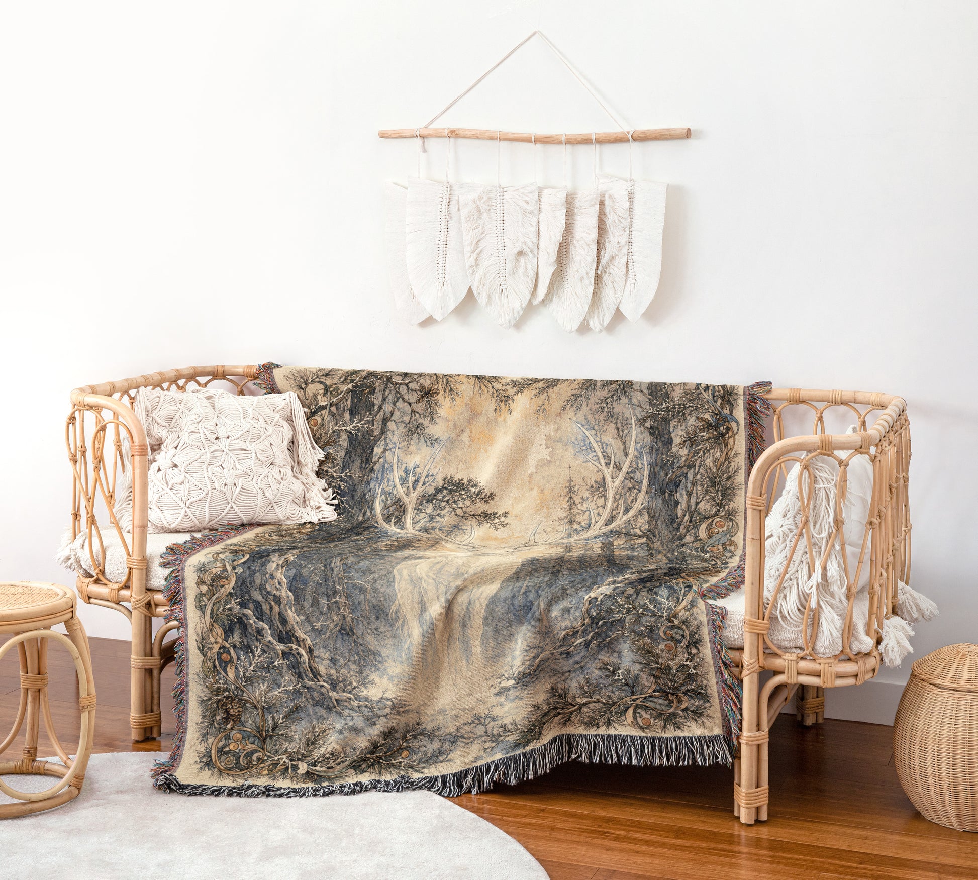 a cozy living room with a wicker sofa, a woven basket, and a decorative wall hanging with white feathers.