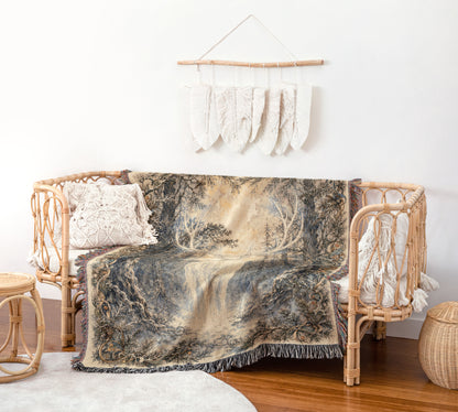 a cozy living room with a wicker sofa, a woven basket, and a decorative wall hanging with white feathers.