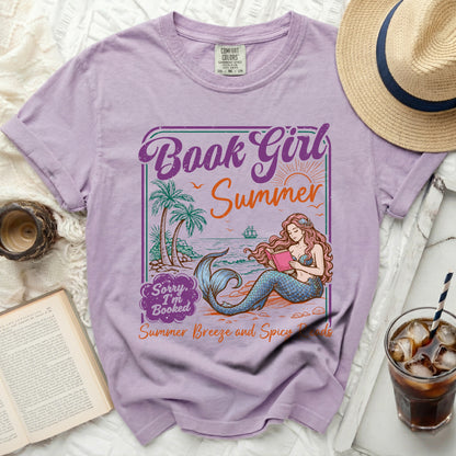 Purple t-shirt with "Book Girl Summer" graphic of a mermaid reading.