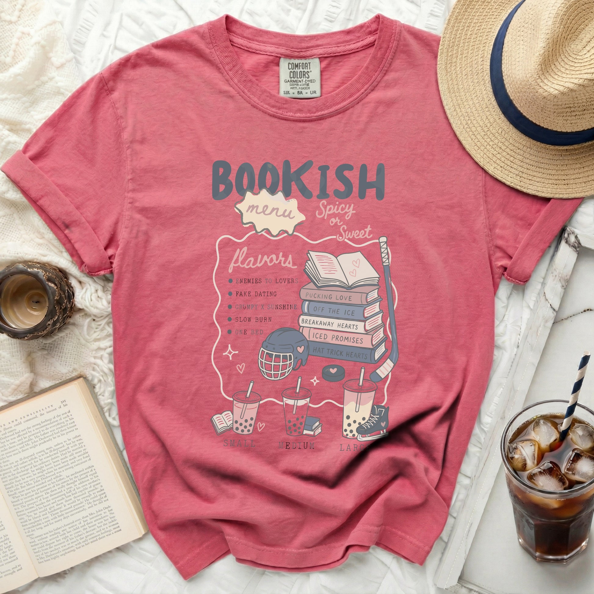 "Bookish Menu" t-shirt with romance novel tropes and bubble tea illustrations.