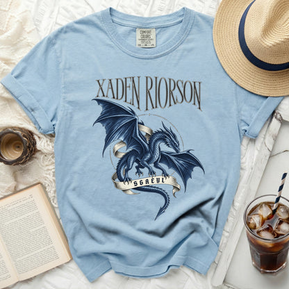 Light blue t-shirt with dark blue dragon design and "Xaden Riorson SGAEYL" text.