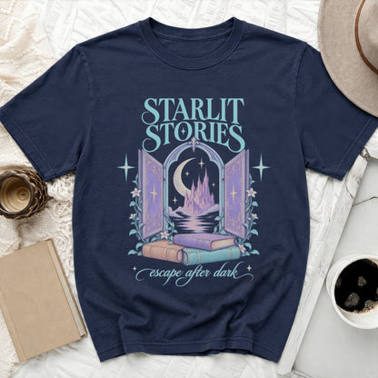 Dark t-shirt with "Starlit Stories escape after dark" text and castle graphic.