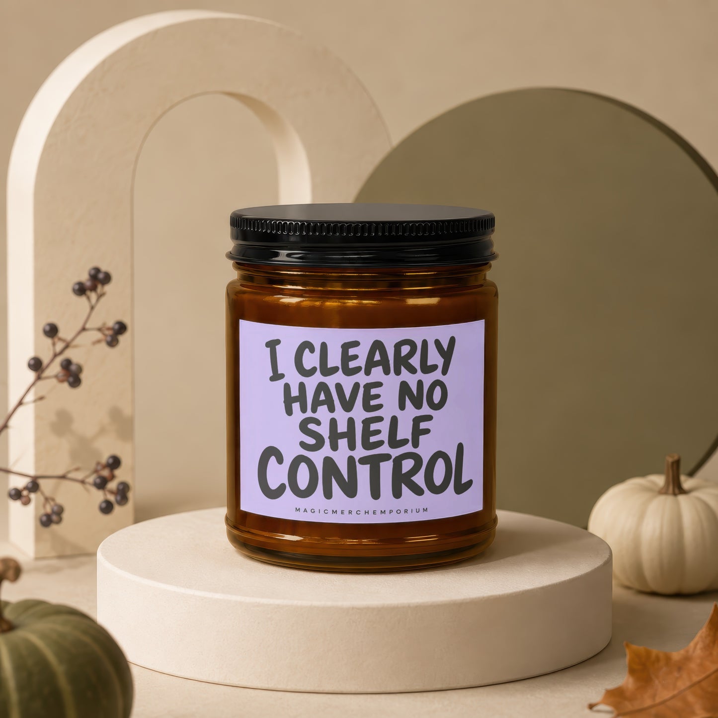 Candle with "I CLEARLY HAVE NO SHELF CONTROL" text on a pale purple label.
