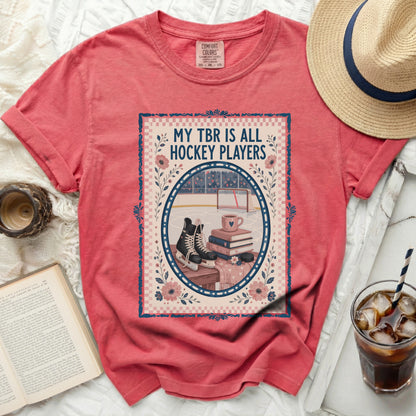 T-shirt with hockey rink, skates, books, and text "MY TBR IS ALL HOCKEY PLAYERS".