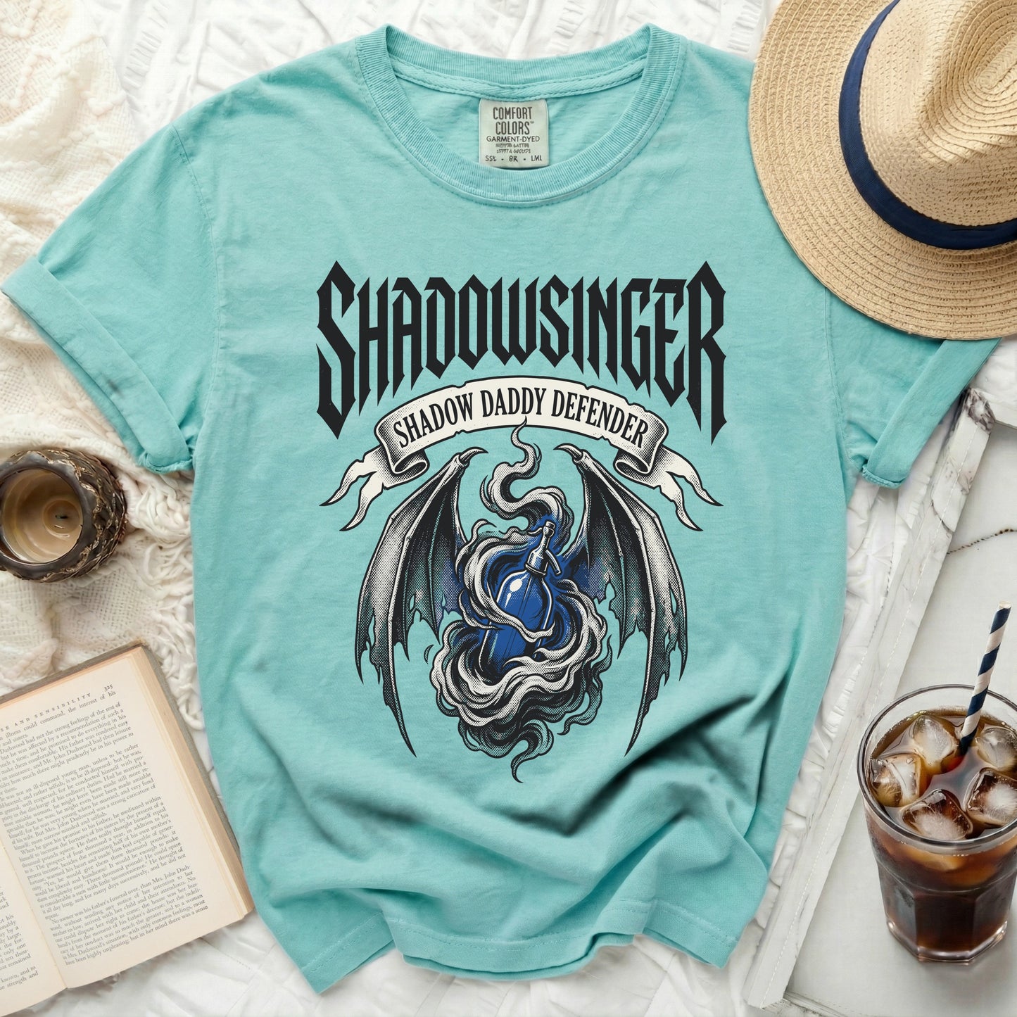 Teal t-shirt with "Shadowsinger Shadow Daddy Defender" graphic and dragon wings.