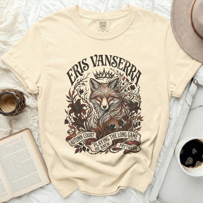 Cream t-shirt with a fox illustration and text: "Eris Vanserra, Autumn Court, Playing the Long Game, He Knew, Phrythian"