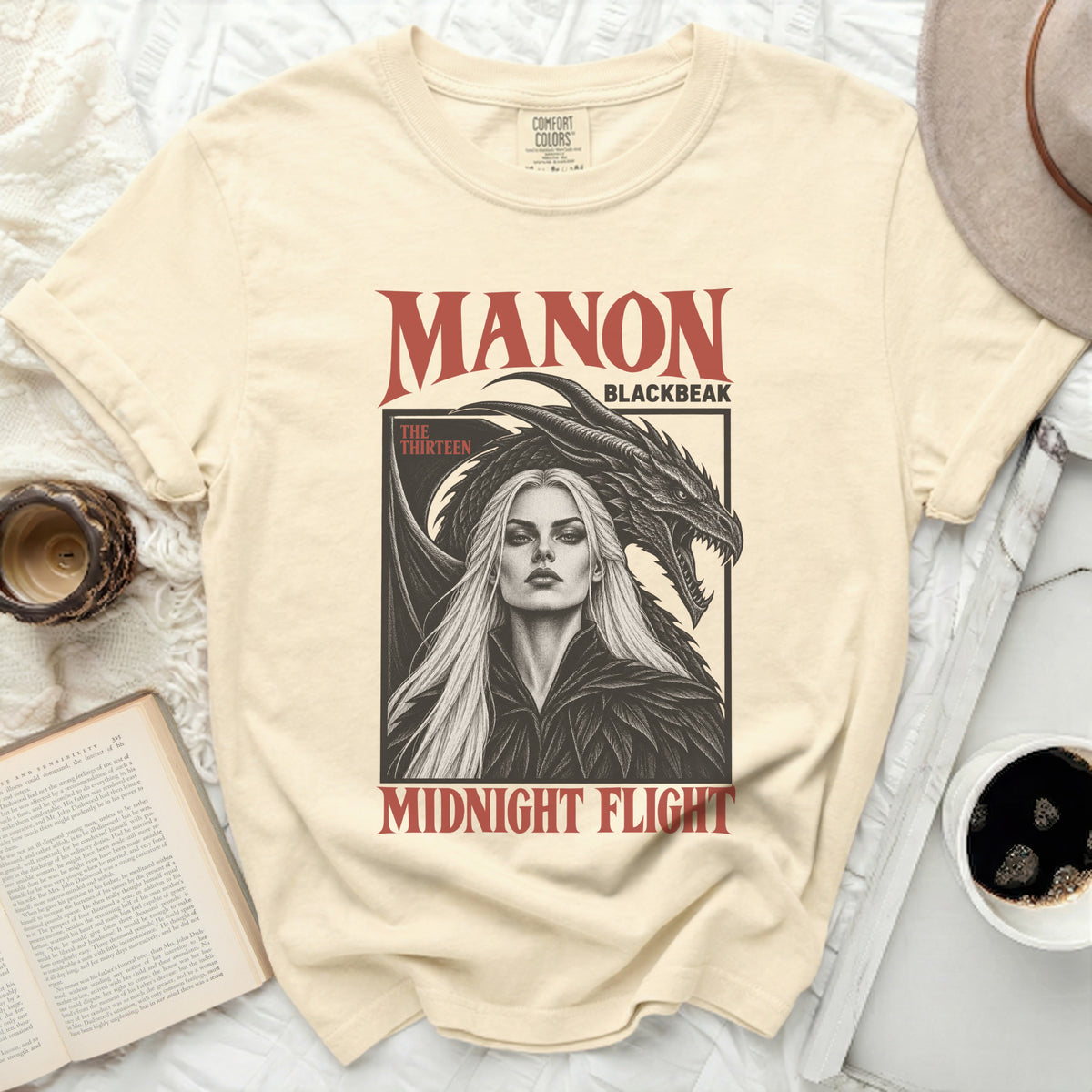 Manon Blackbeak Midnight Flight graphic t-shirt featuring a woman and a dragon.