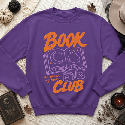 Purple sweatshirt with Halloween graphic: "BOOK see you in my book CLUB".