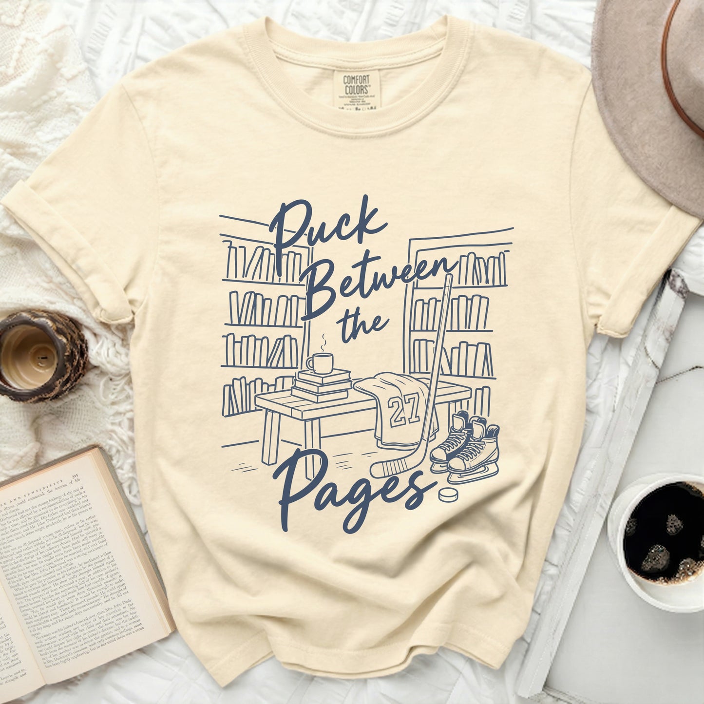 Puck Between the Pages Hockey Tee