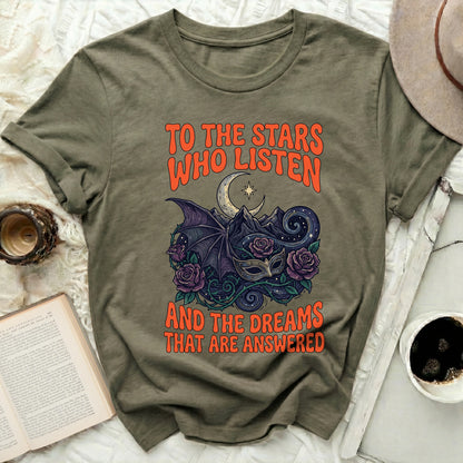 TO THE STARS WHO LISTEN AND THE DREAMS THAT ARE ANSWERED
Celestial design
Mystical apparel
Fantasy graphic
Moon imagery
Stars art
Bat wing design
Rose illustration
Masquerade mask
Mountain landscape
Dream themed
Quote shirt
Inspirational text
Aesthetic tee
Unique artwork
Dark fantasy
Spiritual motif
Galactic theme
Creative design
Nature elements
Mythical creatures