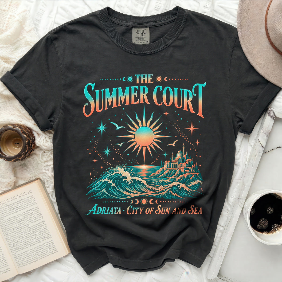 Black t-shirt with graphic of "The Summer Court Adriata: City of Sun and Sea".