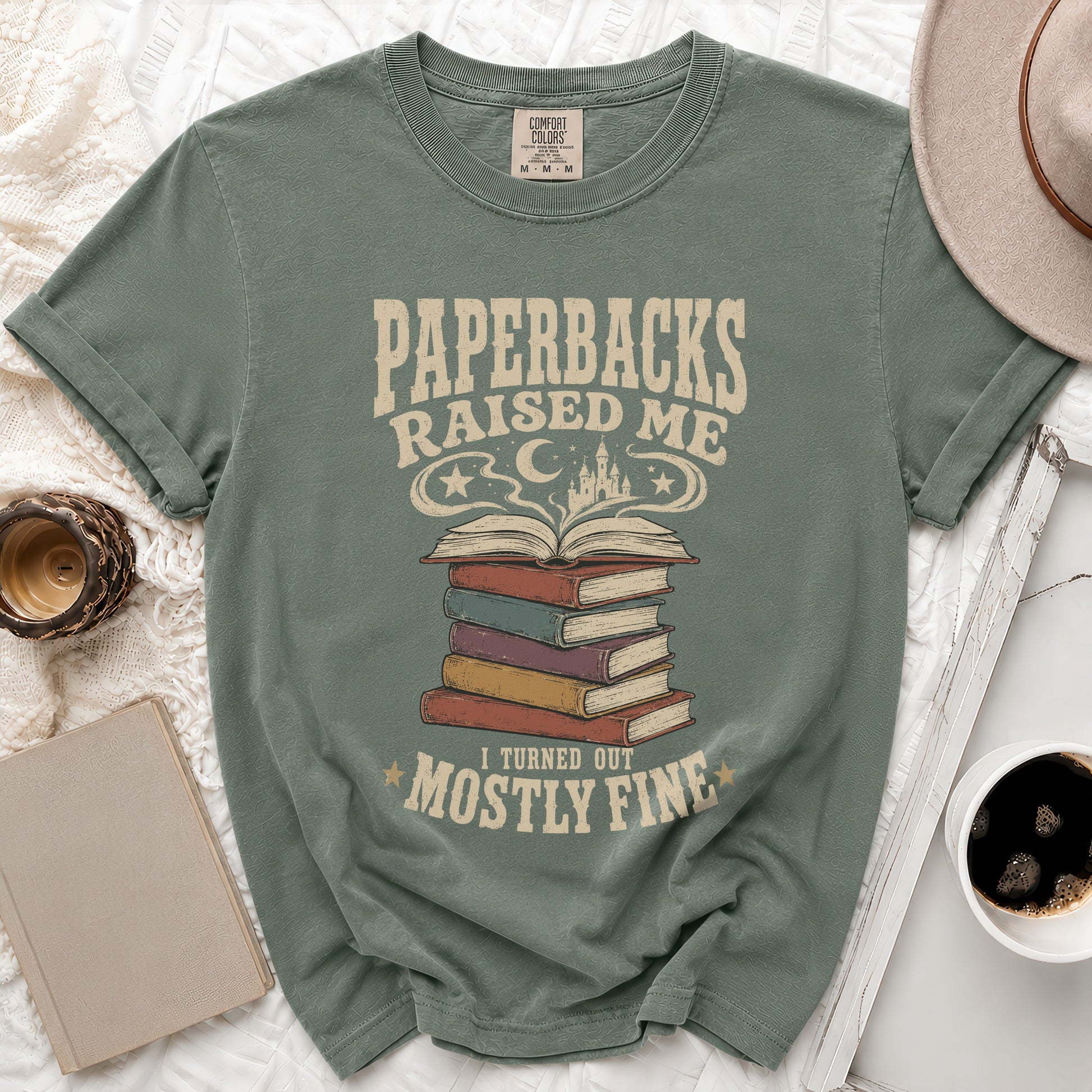 T-shirt with "Paperbacks Raised Me" and a stack of books.