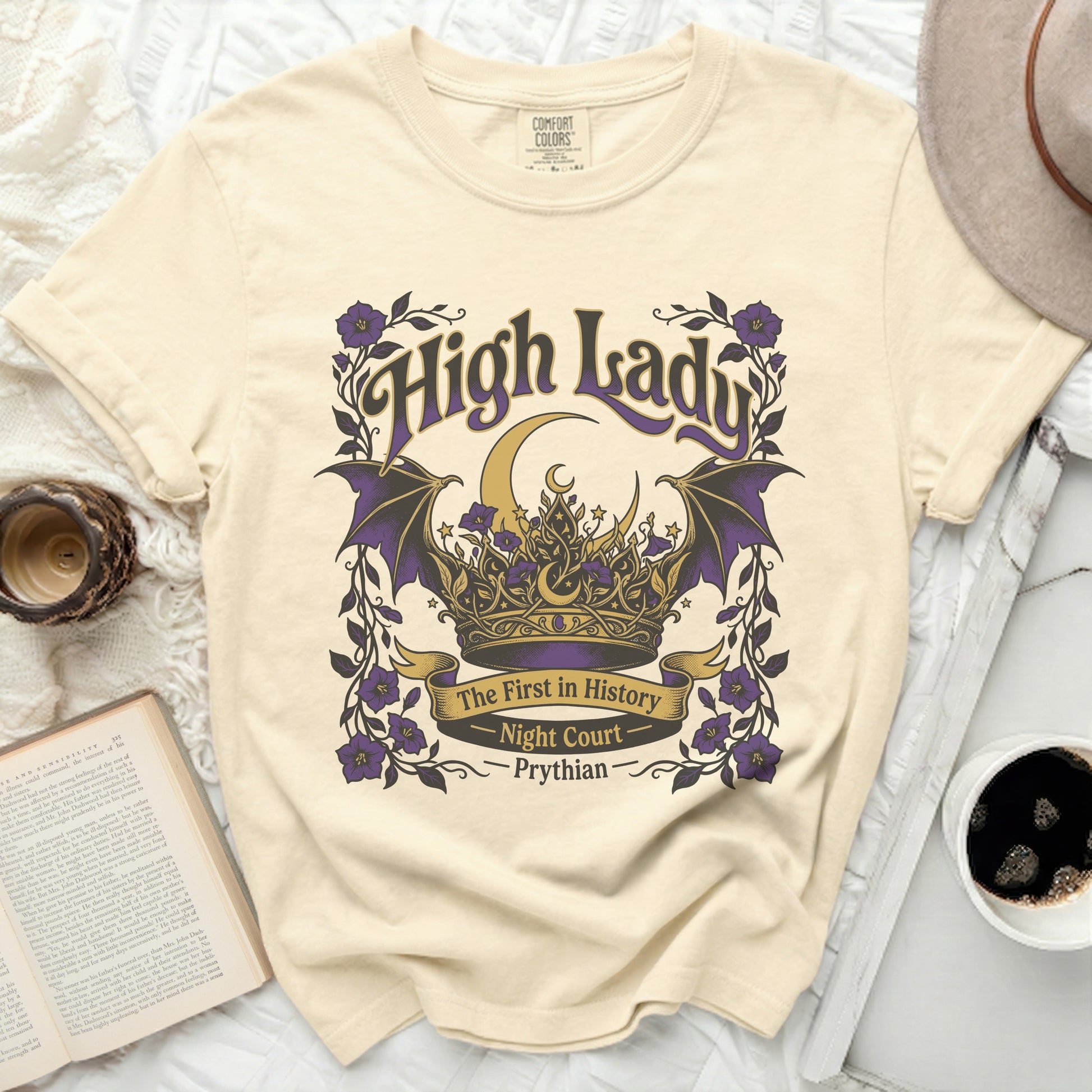 Cream t-shirt with "High Lady The First in History Night Court Prythian" graphic.