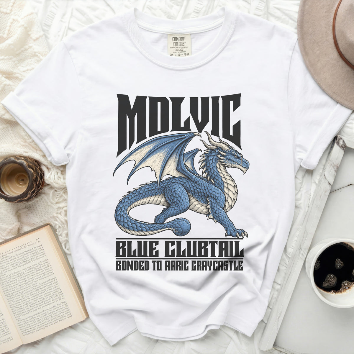 White t-shirt with blue dragon graphic and text "MOLVIC BLUE CLUBTAIL BONDED TO AARIC GRAYCASTLE."