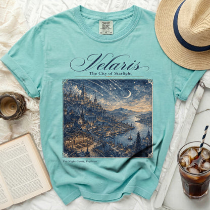 Teal Comfort Colors t-shirt with "Velaris The City of Starlight" and starry city graphic.