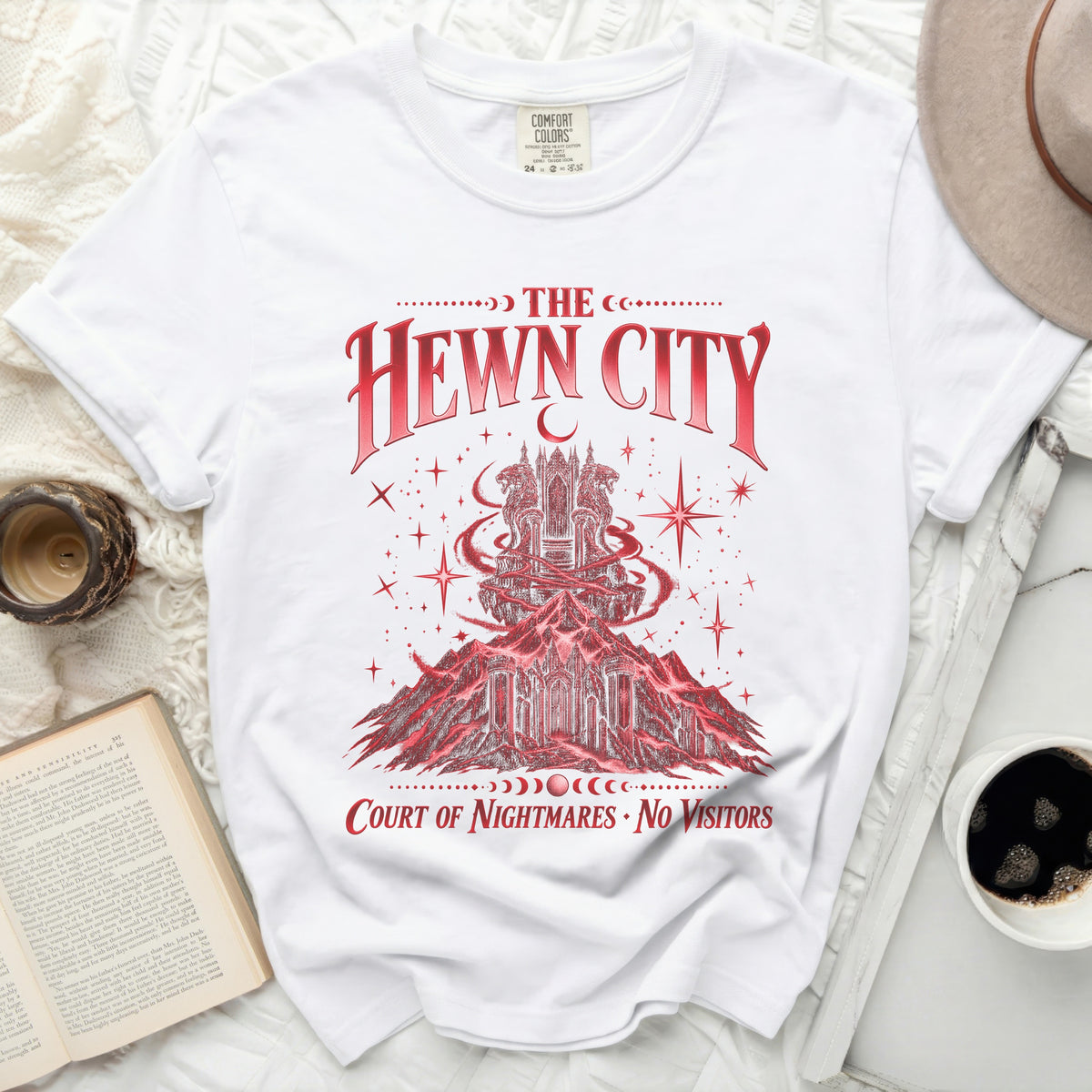 The Hewn City Court of Nightmares graphic tee with castle and moons.