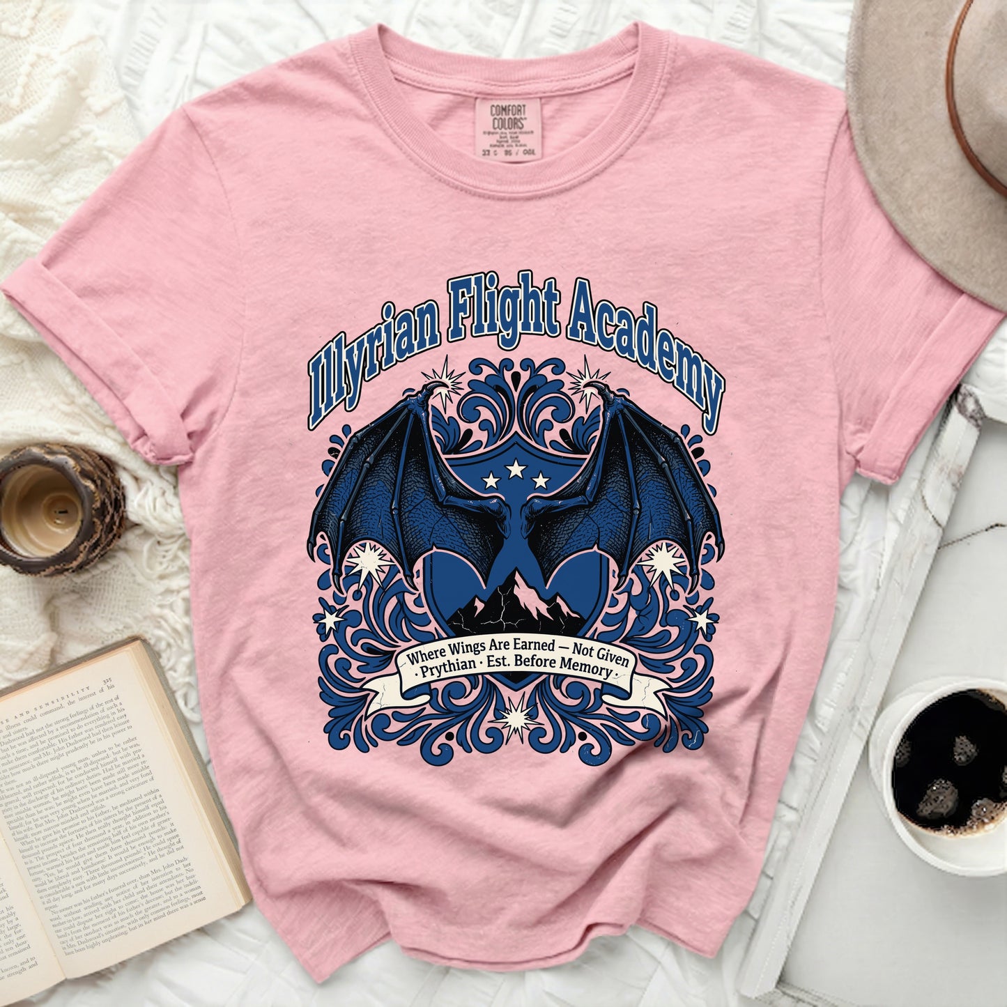 Pink t-shirt with "Myrian Flight Academy" and wings graphic.