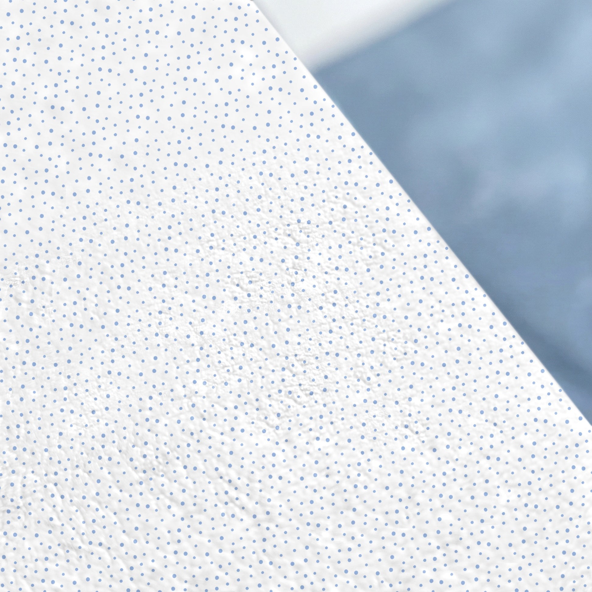 White and Blue Polka Dot Patterned Fabric Product