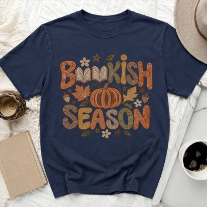 Navy t-shirt with "Bookish Season" text, pumpkin, and autumn leaves graphic.