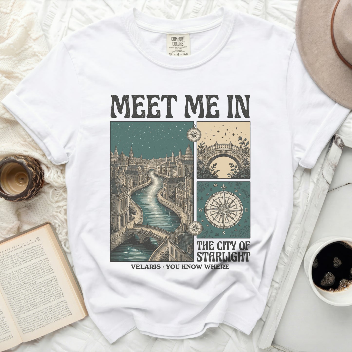 White t-shirt with "Meet Me In The City of Starlight Velaris" graphic.