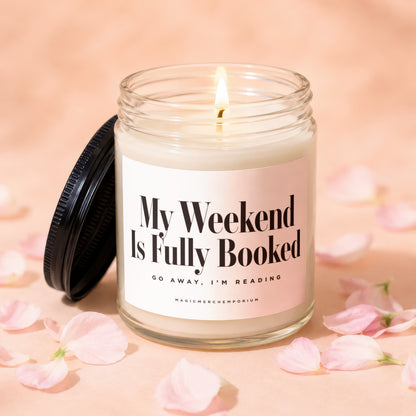 Candle with text "My Weekend Is Fully Booked. Go Away, I'm Reading."