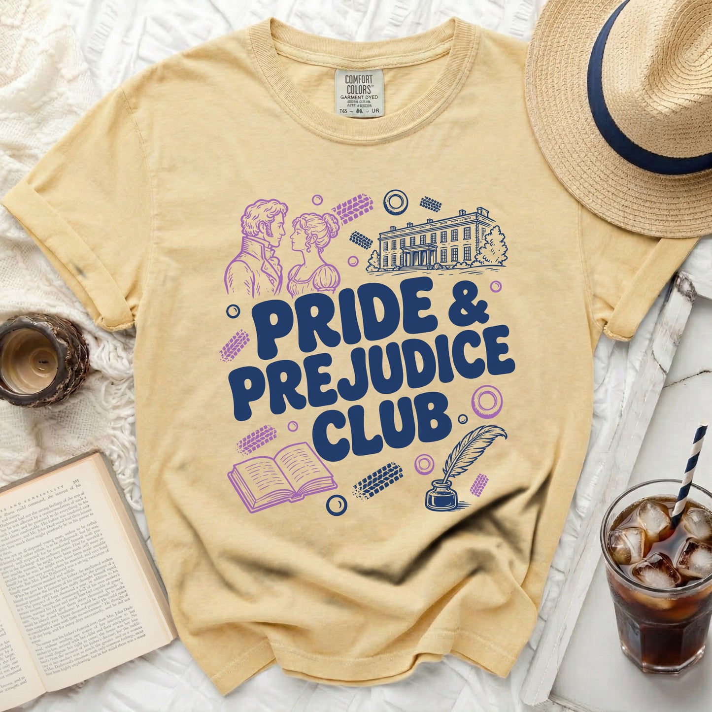 Yellow t-shirt with "Pride & Prejudice Club" graphic and regal scene.
