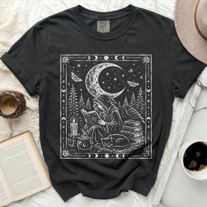 Black t-shirt with white moon, stars, trees, and witch graphic.