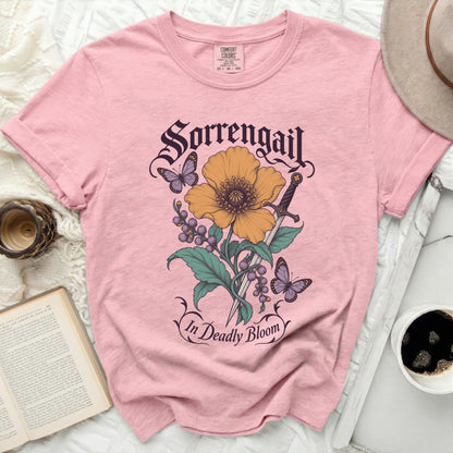 Pink t-shirt with "Sorrengail In Deadly Bloom" text and floral graphic.