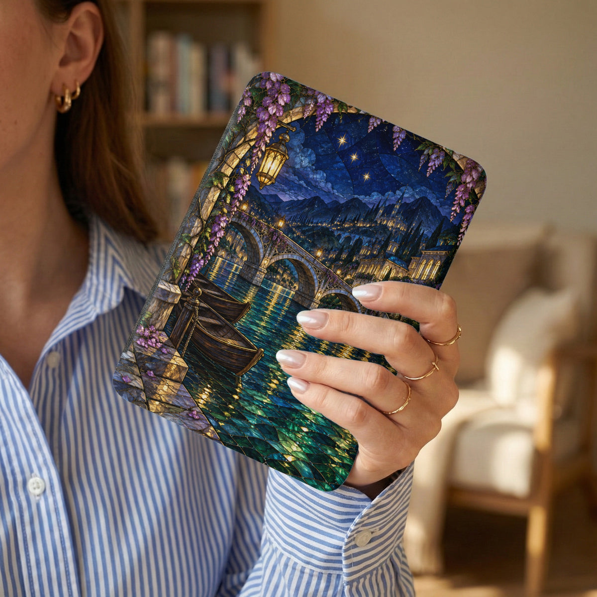 Case with stained glass design of wisteria, bridge, boats, and cityscape at night.