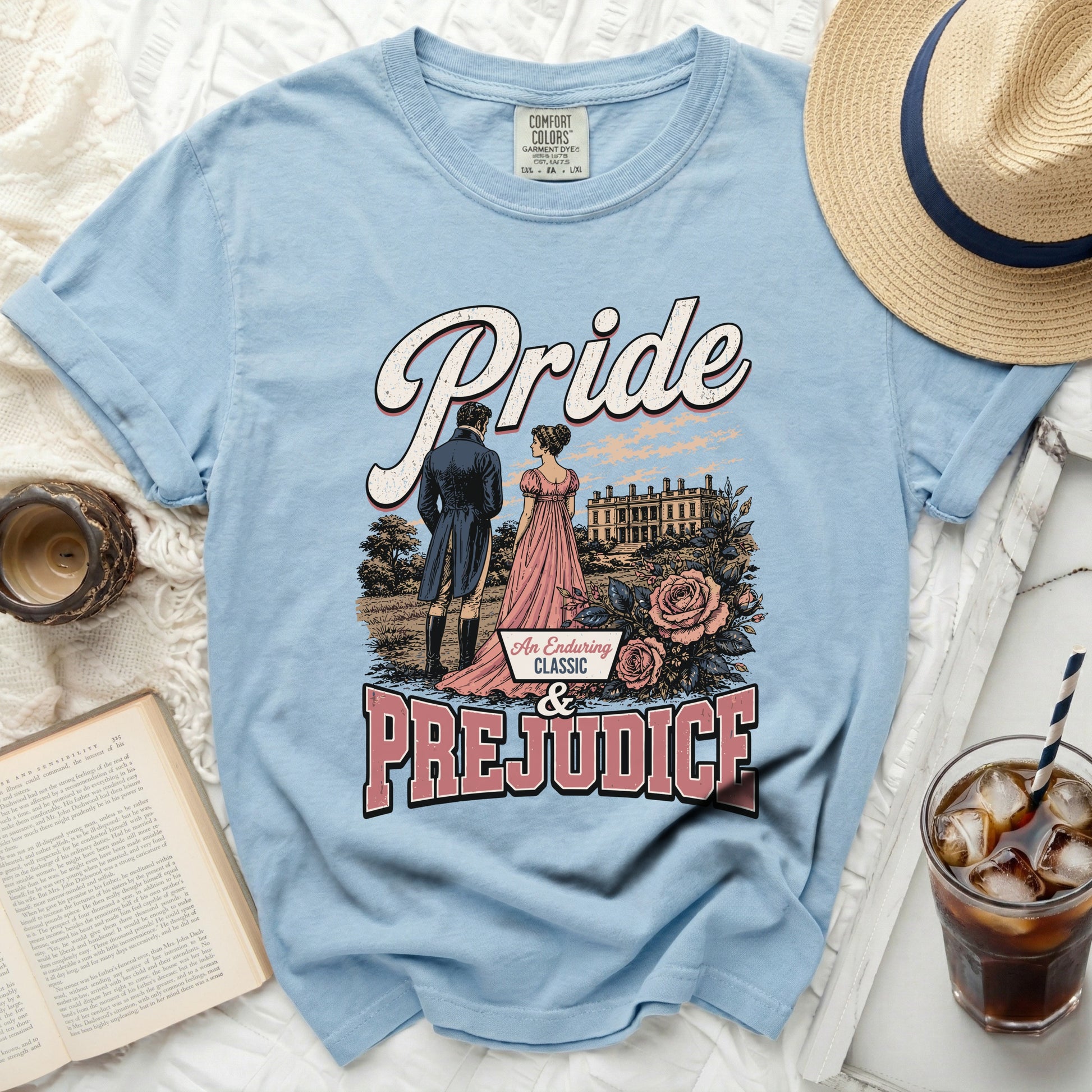 Pride and Prejudice vintage graphic t-shirt with couple and estate illustration.