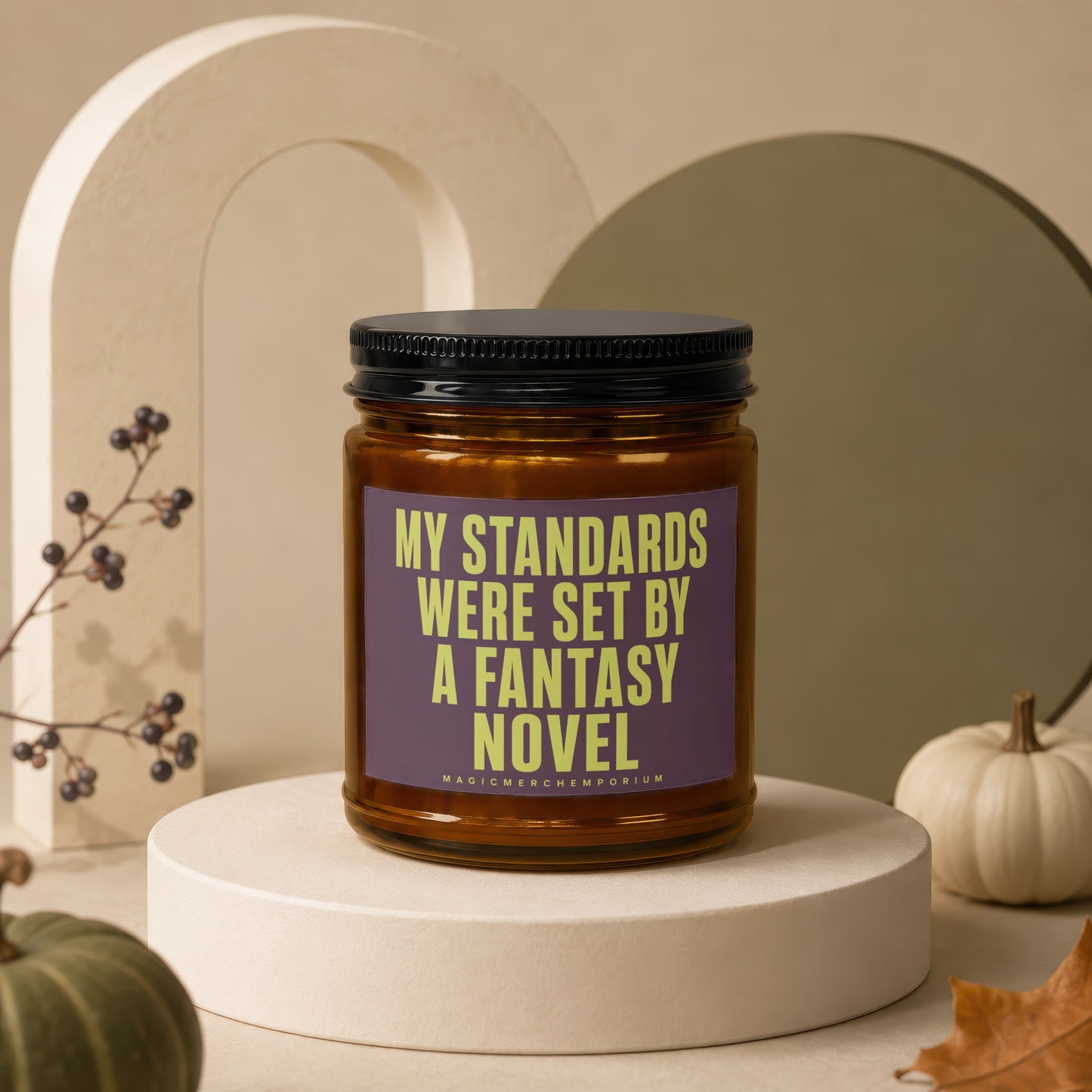 Candle with text "My Standards Were Set By A Fantasy Novel" on purple label.