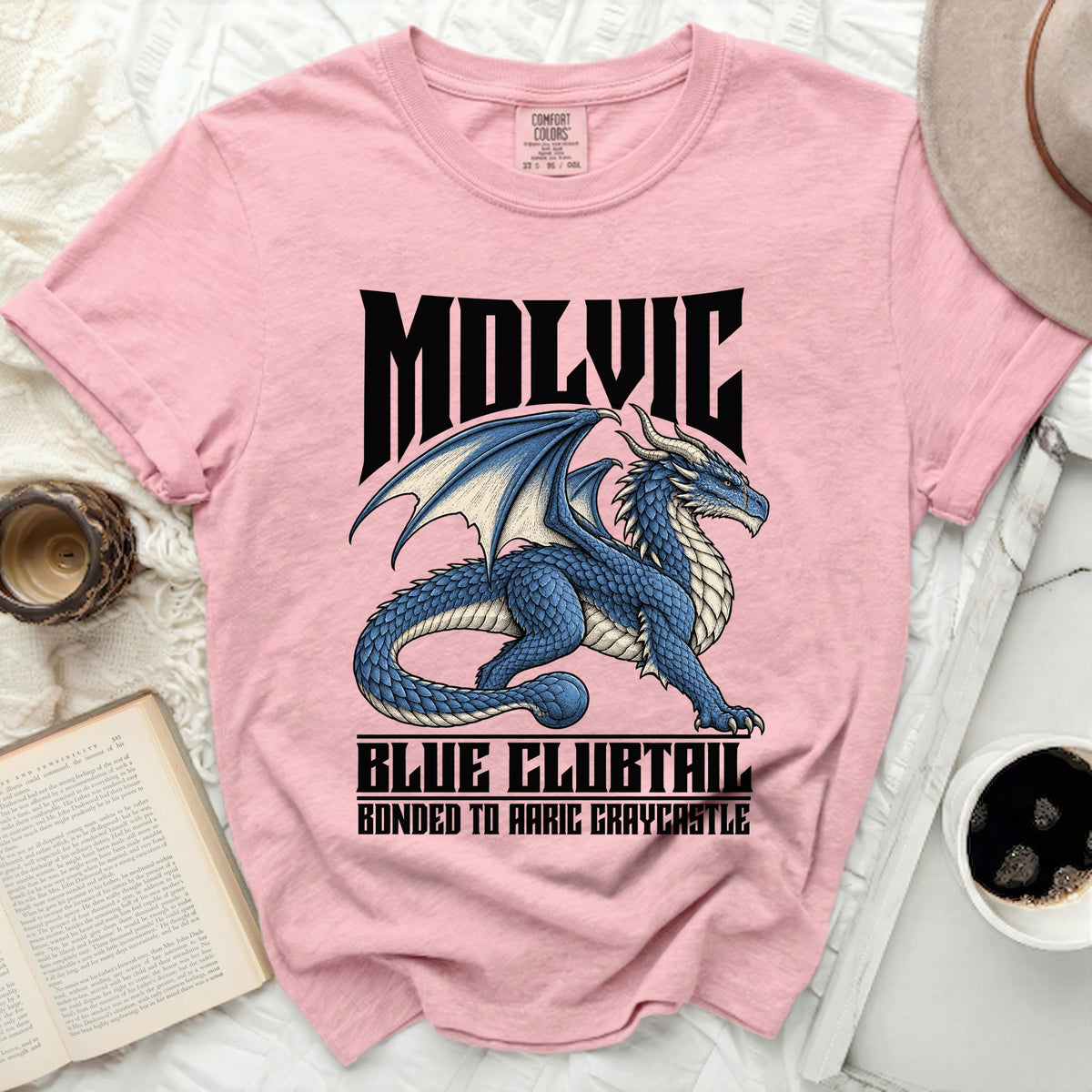 Pink t-shirt with blue dragon graphic and text "MOLVIC BLUE CLUBTAIL BONDED TO AARIC GRAYCASTLE".