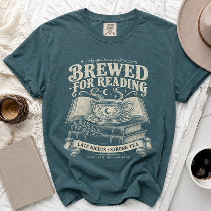 T-shirt with text "Brewed for Reading" and a design of a teacup on books.