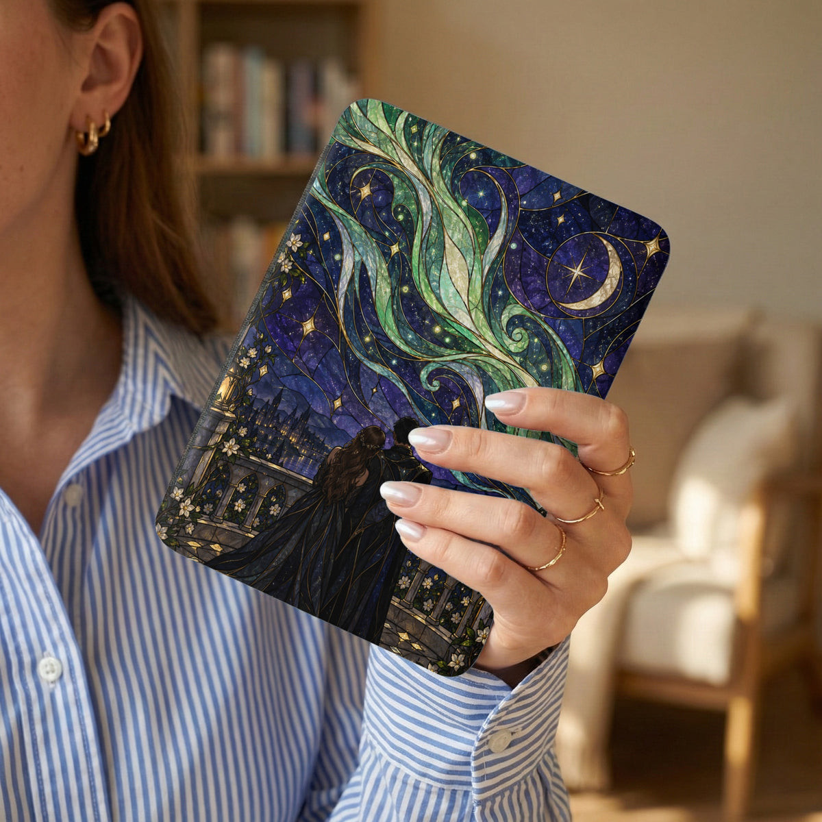 Case with stained glass design of couple looking at starry night city skyline.