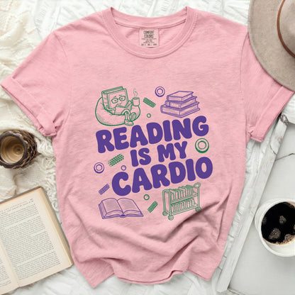 Pink t-shirt with "Reading Is My Cardio" graphic and book illustrations.