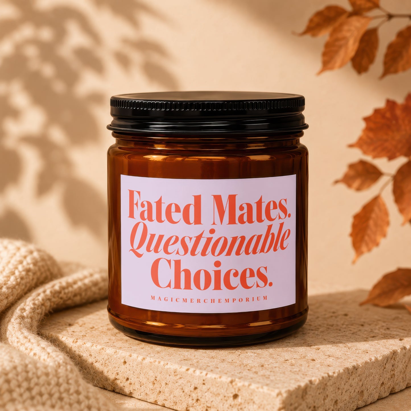 Amber candle in glass jar with black lid and label "Fated Mates. Questionable Choices."