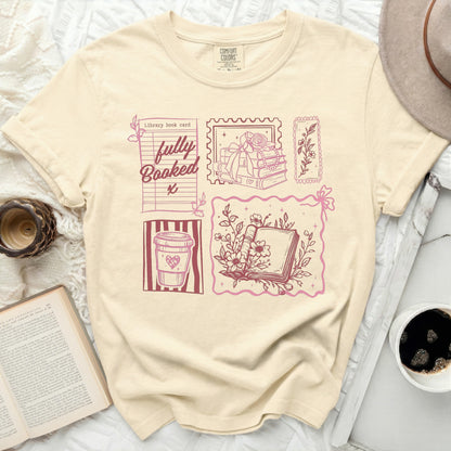 T-shirt with library-themed graphics and "Fully Booked" text.