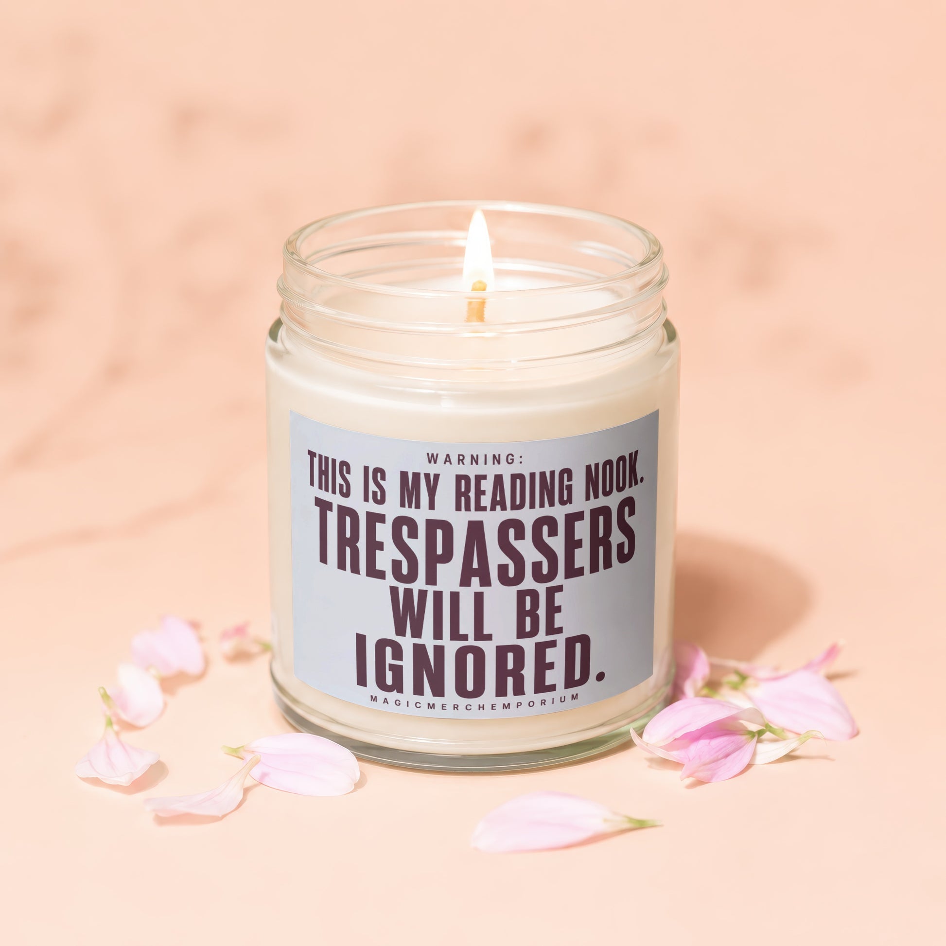 Candle with text "Warning: This is my reading nook. Trespassers will be ignored."