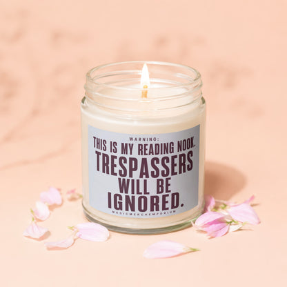Candle with text "Warning: This is my reading nook. Trespassers will be ignored."