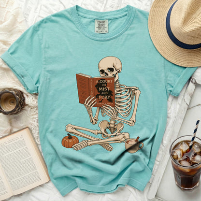 Skeleton reading "A Court of Mist and Fury" by Sarah J. Maas on t-shirt.