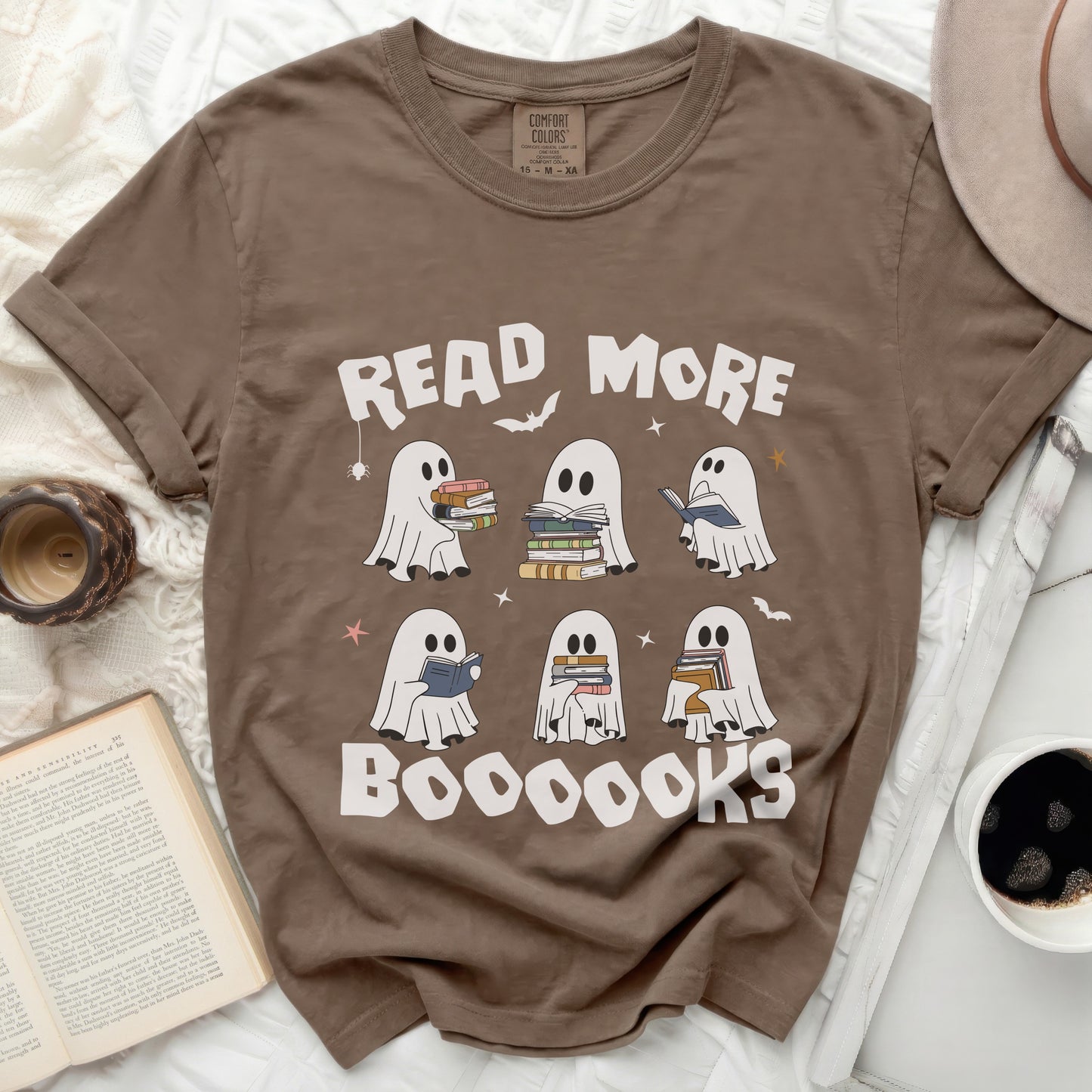 Brown t-shirt with "Read More Boooooks" text and cartoon ghosts reading books.